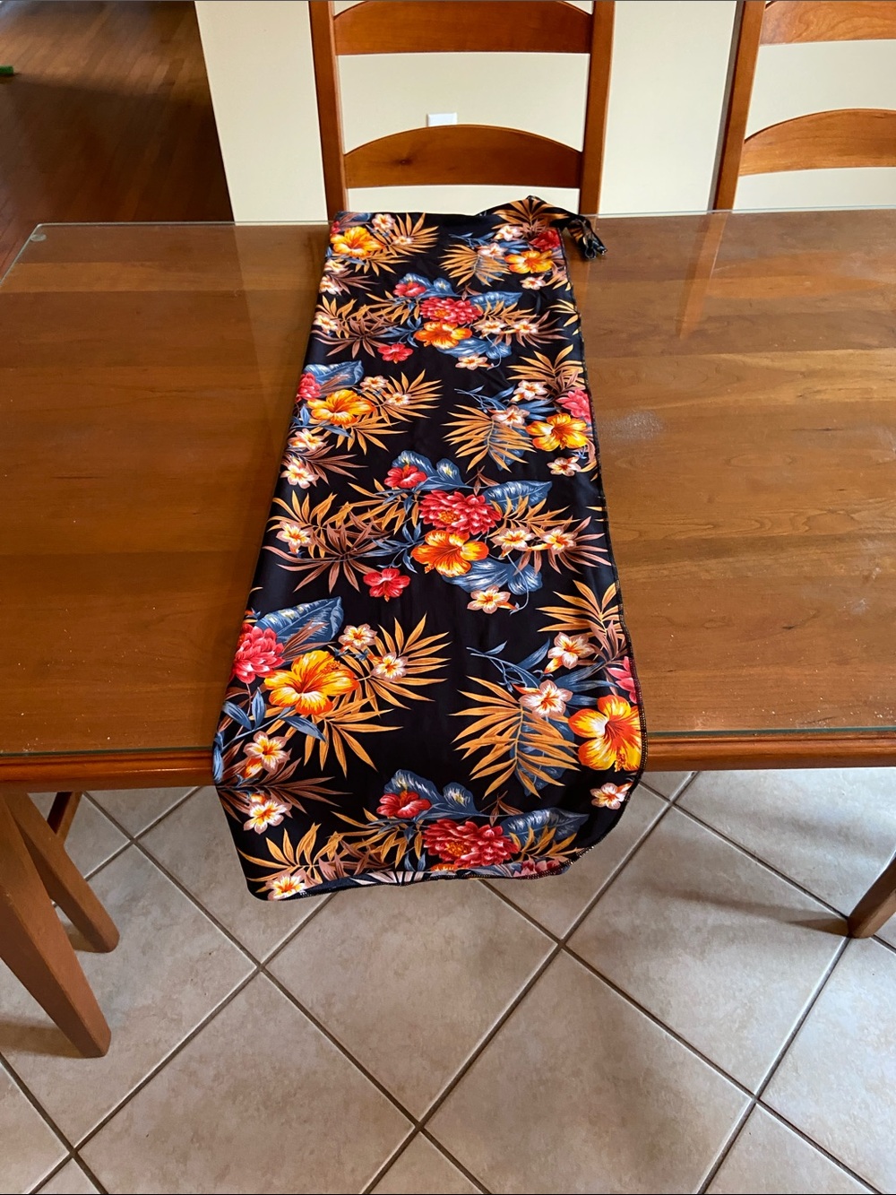 Coolibar Black Floral Tropical Swim Sarong with Orange and Blue Accents. Mint